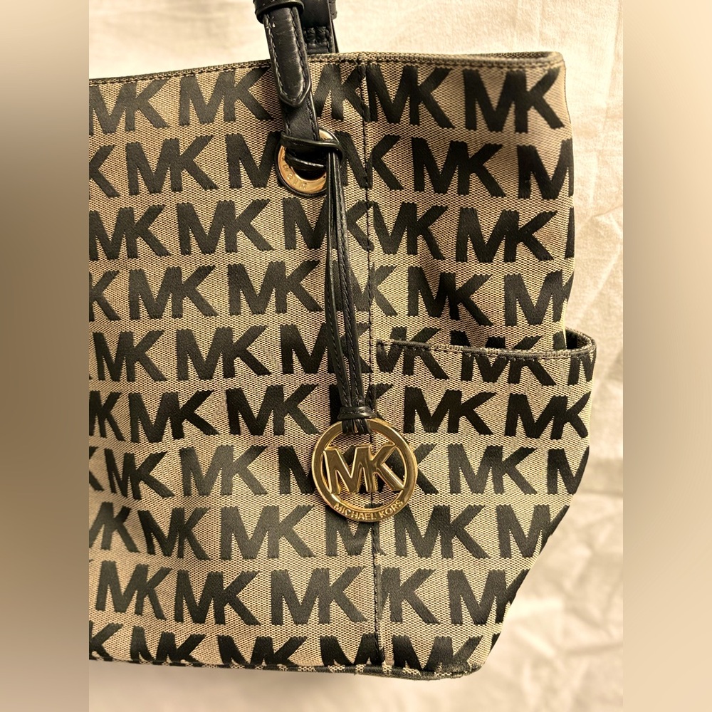 Michael Kors canvas shoulder bag.